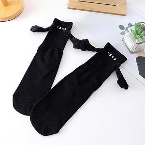 Step into fun with these magnetic attraction cartoon eye couple socks!