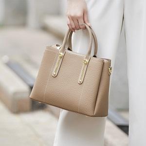 Own a piece of art with this limited edition handmade leather shoulder bag!