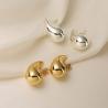 Add a touch of vintage charm with our Chunky Vintage Gold Silver Teardrop Earrings!