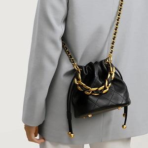 Elevate your style with the Genuine Leather Quilted Drawstring Bucket Bag