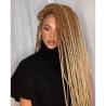 African hair braiding by Aida
