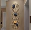 Add a touch of elegance to your space with the Contemporary Metal Ginkgo Leaf Wall Décor