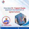How does Dr. Yogesh Gupta approach the treatment of spinal tumors?