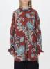 Make a bold statement with this oversized floral semi-transparent shirt
