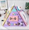 Spark curiosity with this multifunctional pyramid busy board for kids