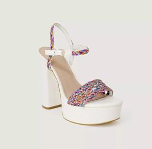 Step into effortless style this season with these white block heel sandals from Guess.