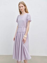 Add a pop of color and elegance to your wardrobe with this purple puff sleeve dress
